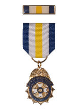 SAR Law Enforcement Commendation Medal: The obverse of the medal depicts a police badge design surmounted by a gold eagle with the SAR Badge below. The medal is accompanied by an enameled bar, suitable for wear on uniform.